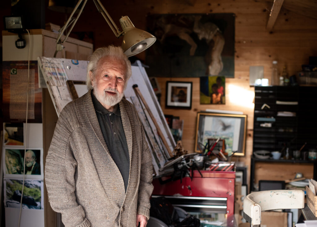 Elderly man in art studio